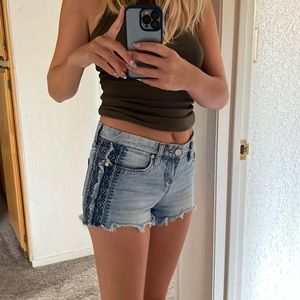 Blank NCY light wash jean cutoff shorts with embroidery. Size 24